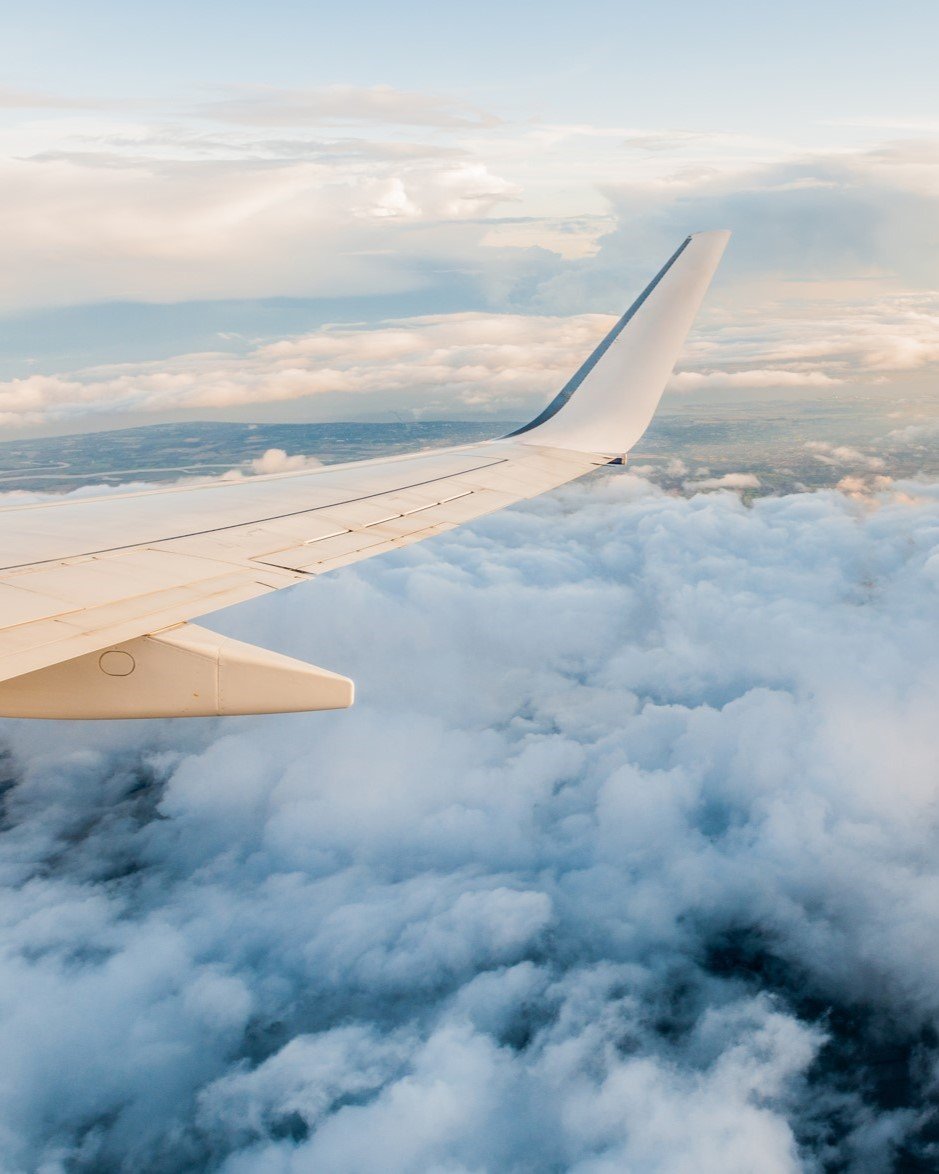 Stock_Airplane above clouds_small-1